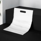 Blank Plastic Shopping Bag Branding Mockups Kit seen from above and is located on the black wooden stairs.