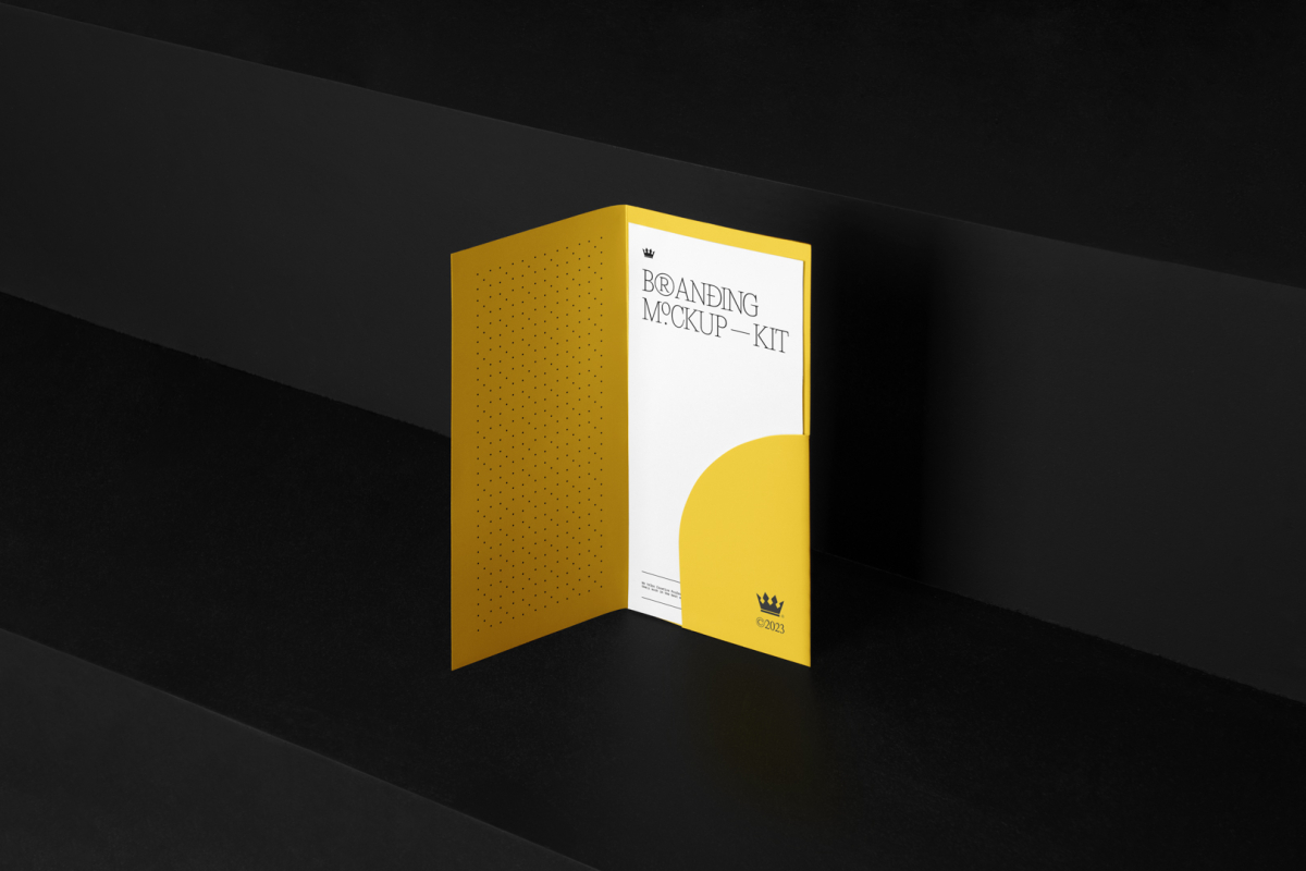 Leaflet Branding Mockups Kit with yellow design seen from front and located on the black wooden stairs.