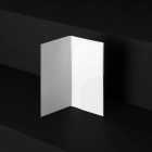 The White Leaflet Branding Mockups Kit seen from the front is located on the black wooden stairs.