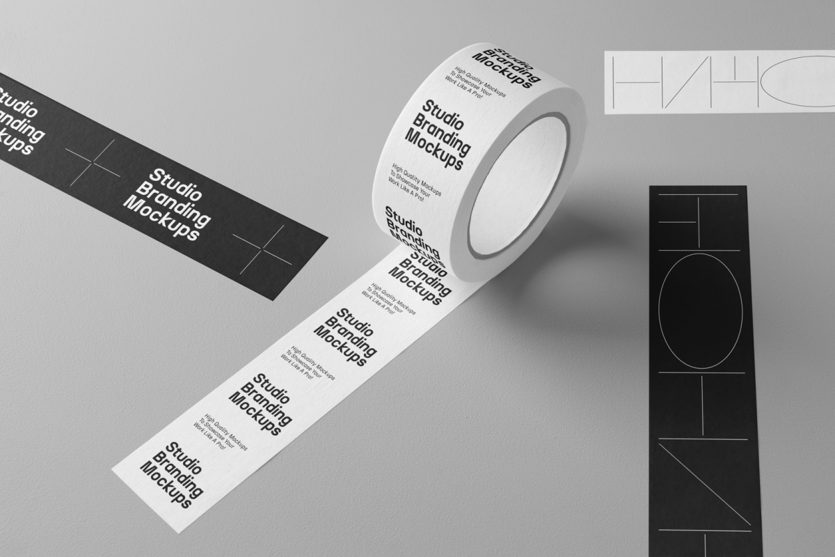 An unrolled adhesive Tape Branding Mockup scene unfolded on the floor, with black and white design seen from above.
