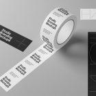 An unrolled adhesive Tape Branding Mockup scene unfolded on the floor, with black and white design seen from above.
