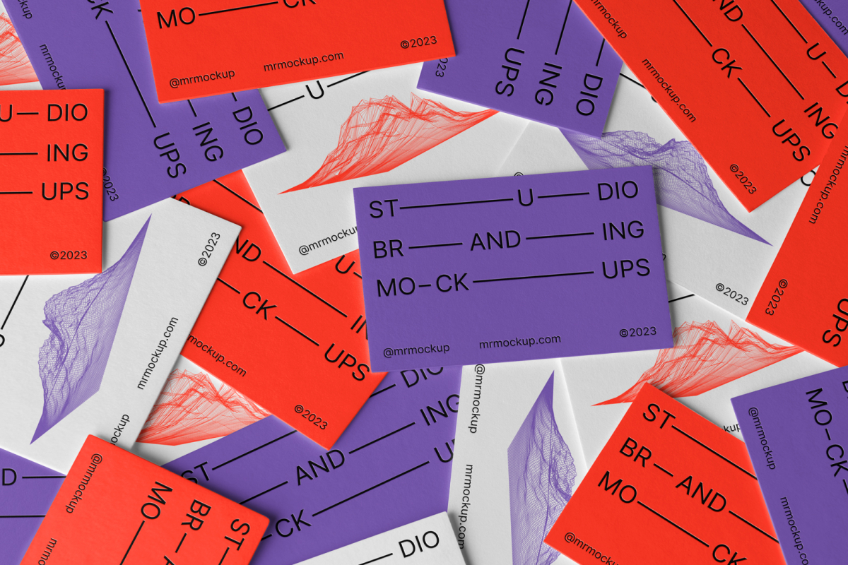 Scattered Business Card Branding Mockups on the floor with colorful design seen from the above.