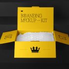 Packaging Box Branding Mockups Kit with bubble foil and yellow design seen from front and located on the black wooden stairs.