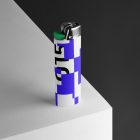 Lighter Branding Mockup with a blue and green design standing on the corner of the cubic against a black background.