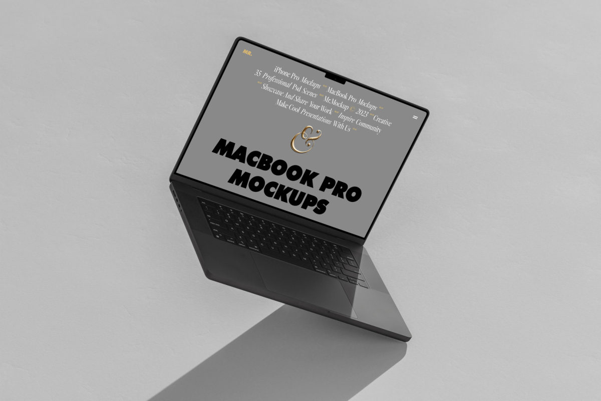 Front view, space gray MacBook Pro Mockup with gray design standing on the bright gray floor and hole background.