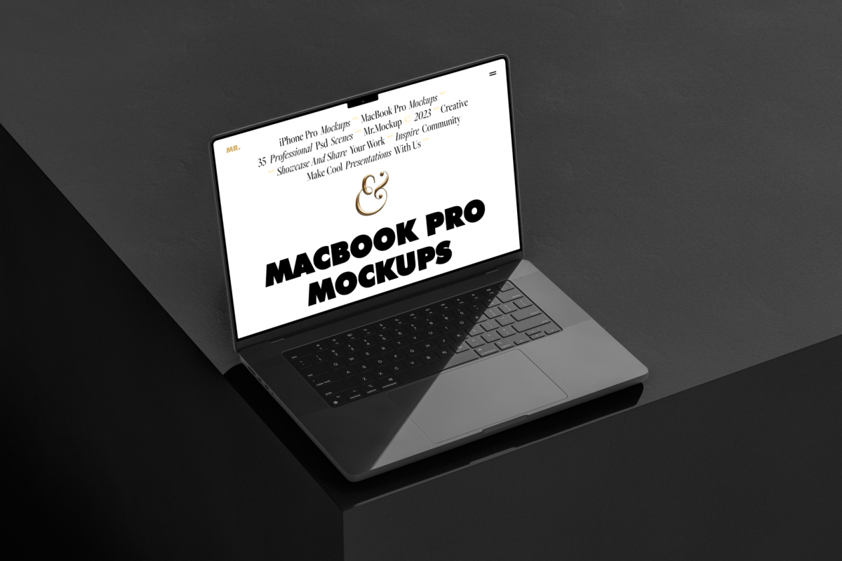 Seen from above, MacBook Pro Mockup with white design standing on the gray/black studio cubic.