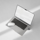 Seen from above, blank MacBook Pro Mockup standing on the rock laying on the white floor.