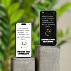 Front view, two iPhone 14 Pro Mockups with white & black design standing on the square piece of concrete against monstera flowers and beige wall.