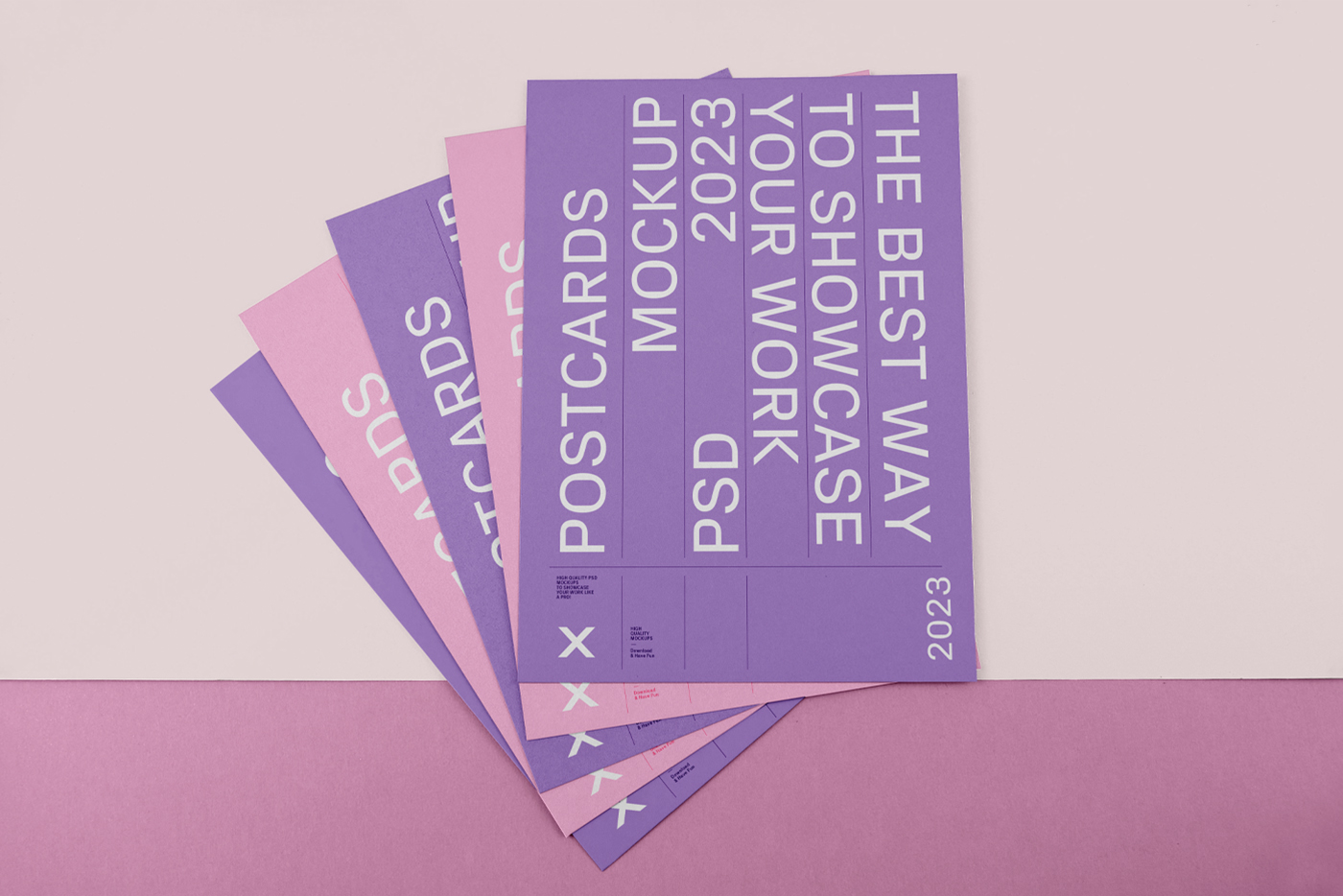 Free four Postcards on Floor Mockup with purple and pink design colors are lying on the beige and pink floor colors.