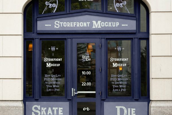 Front view, vintage shop window mockup built in building facade.