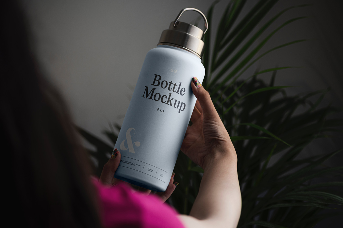 Front view, blue bottle mockup holding by women.