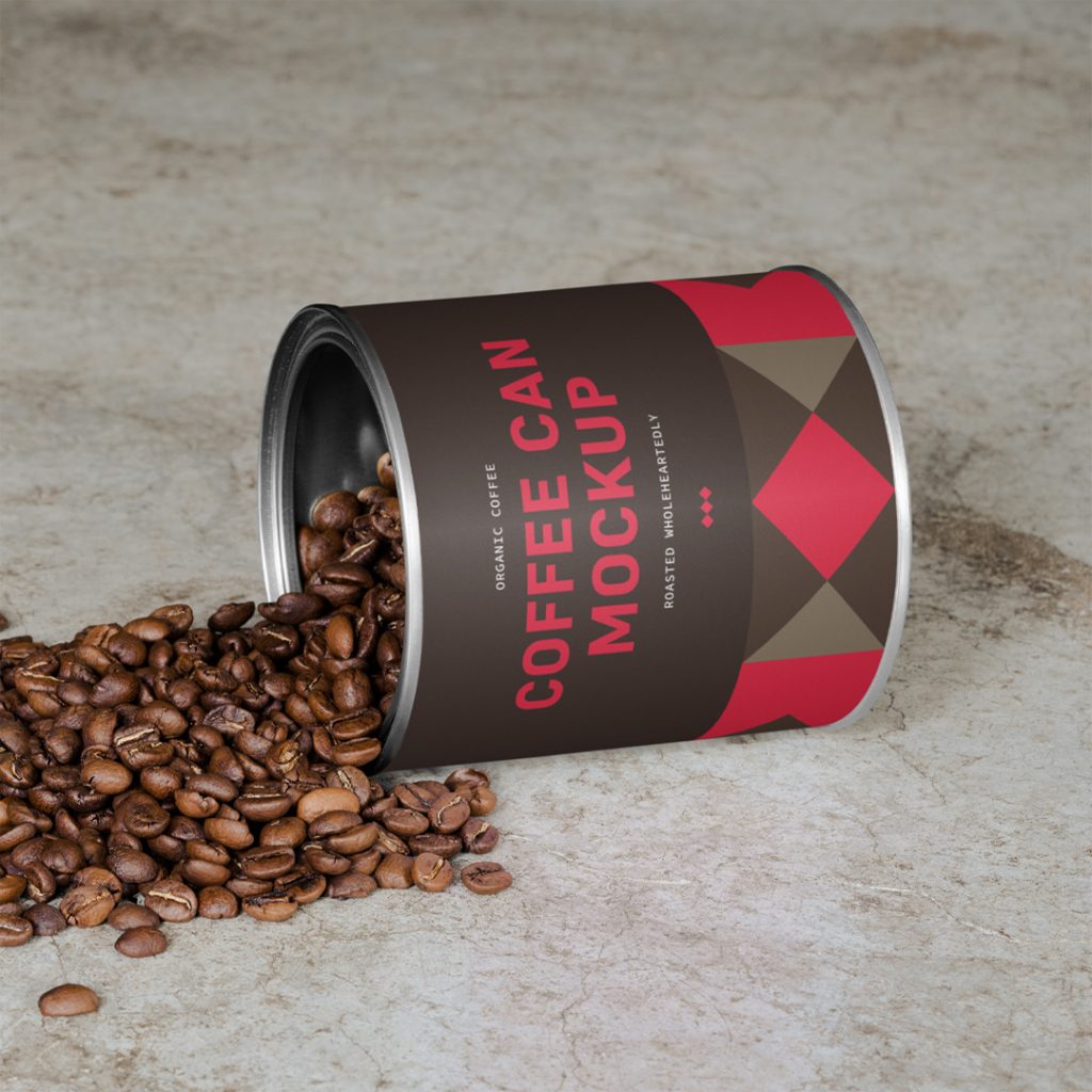 Coffee packaging can mockup laying on the concrete floor.