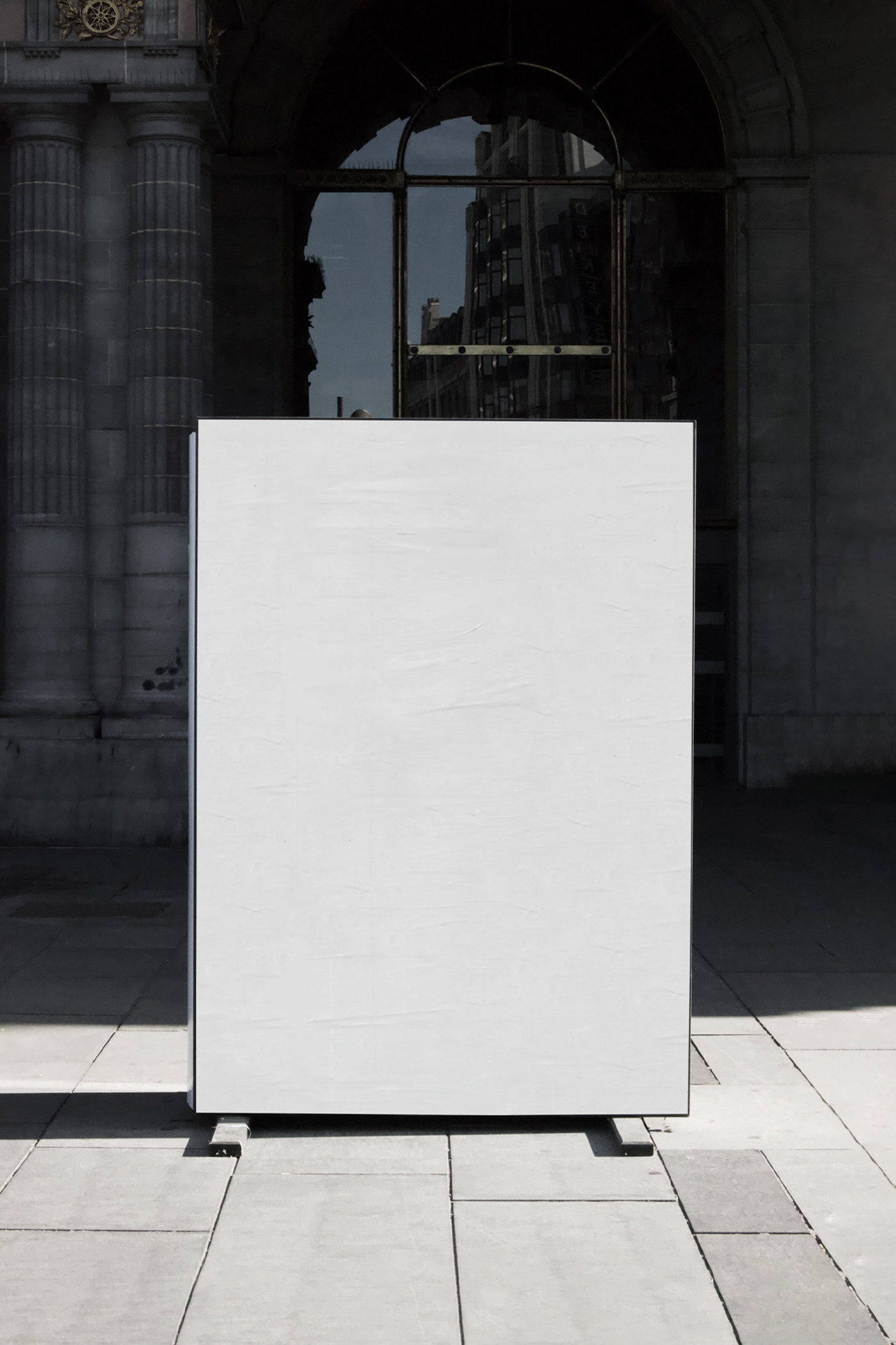 Front view, blank poster mockup in front of the big building.