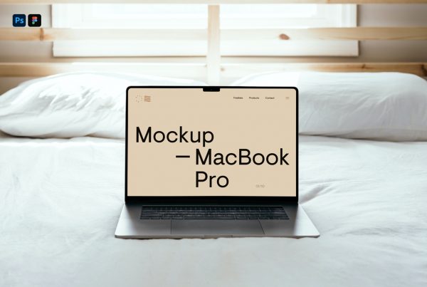 Front view, MacBook Pro Mockup laying on the white bedding inside the house.
