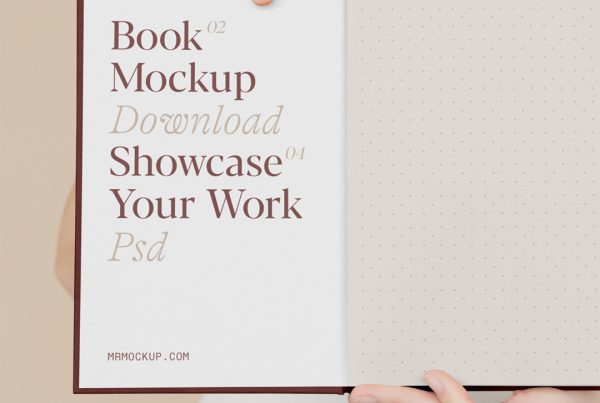 Front view, open book mockup holding by man in front of the beige wall.