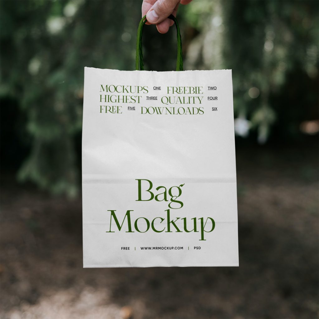 Front view, packaging paper bag mockup in front of the forest.