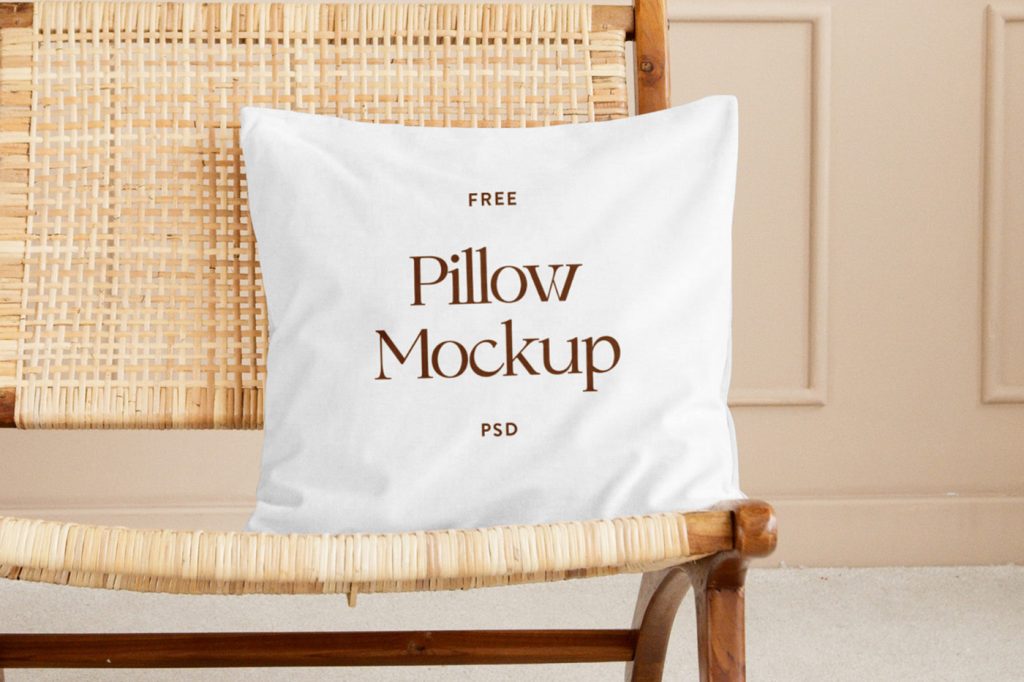 Front view, white pillow mockup laying on the chair inside the flat.