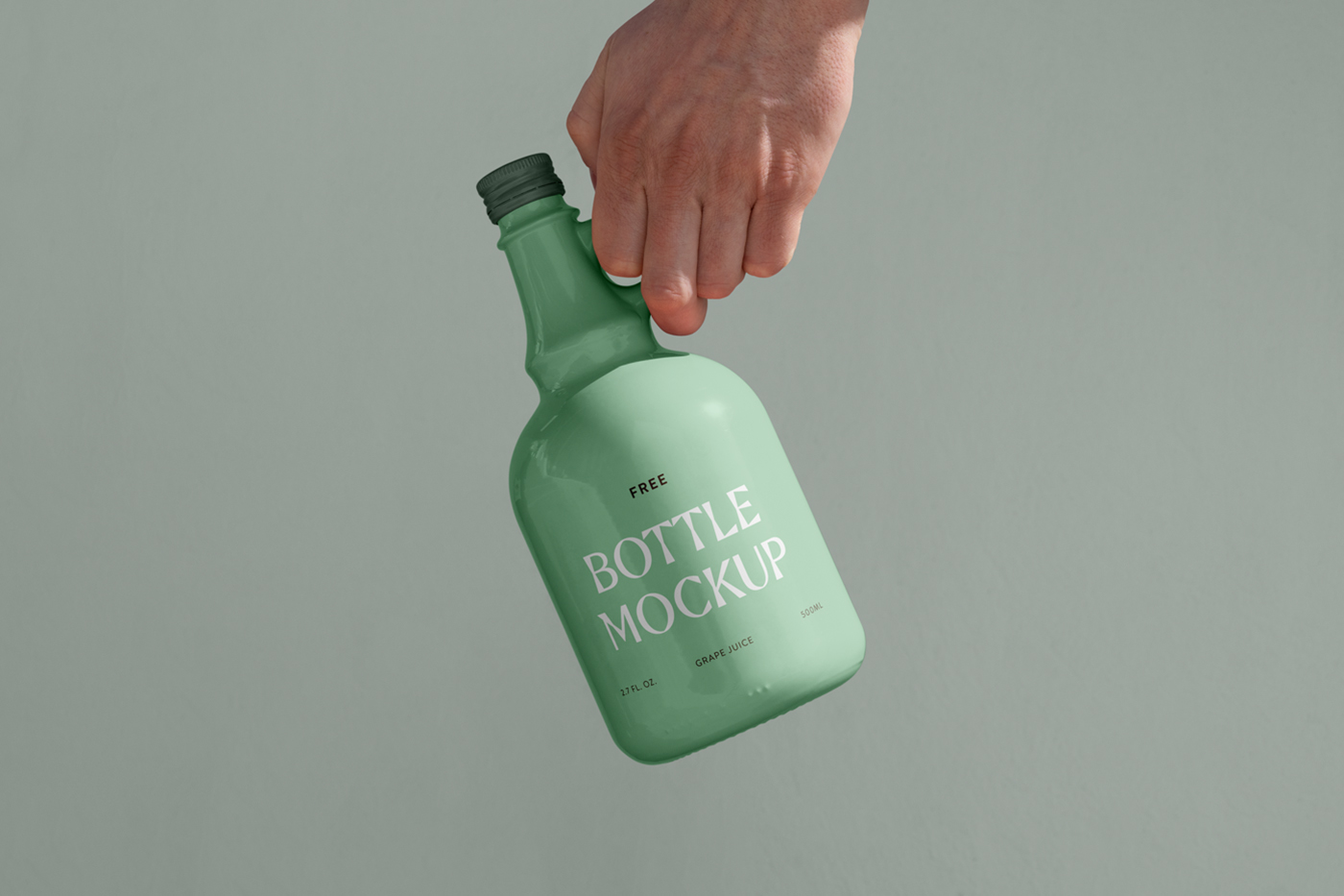 Men holding a green ceramic bottle mockup in front of the green wall.