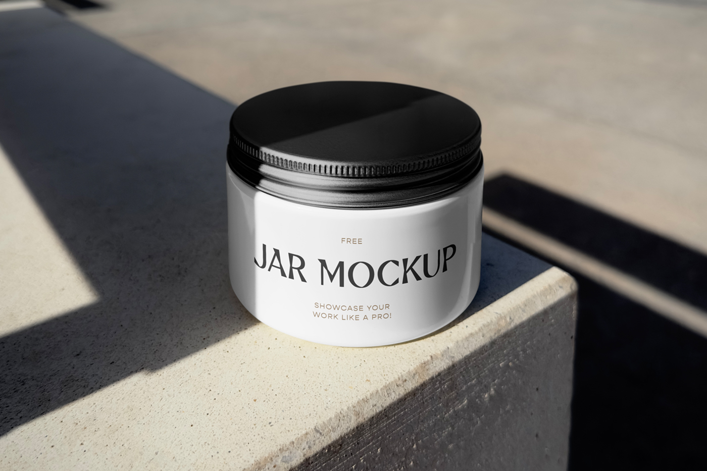 Front view, jar mockup with black lid laying on the concrete floor.