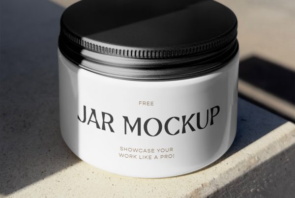 Front view, jar mockup with black lid laying on the concrete floor.