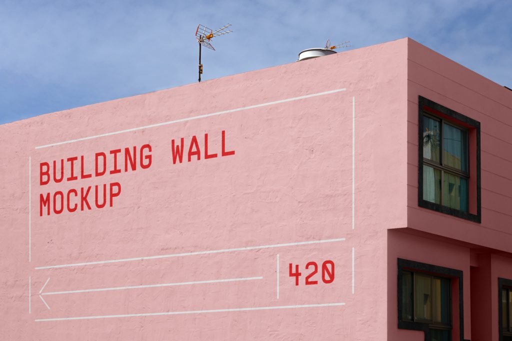 Front view, pink elevation mockup with a visible sky behind.