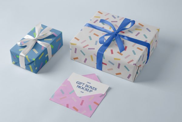 Colorful gift boxes mockup with ribbon laying on the blue floor.