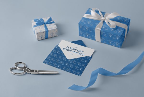 Blue color luxury gift boxes mockup laying on the blue floor.