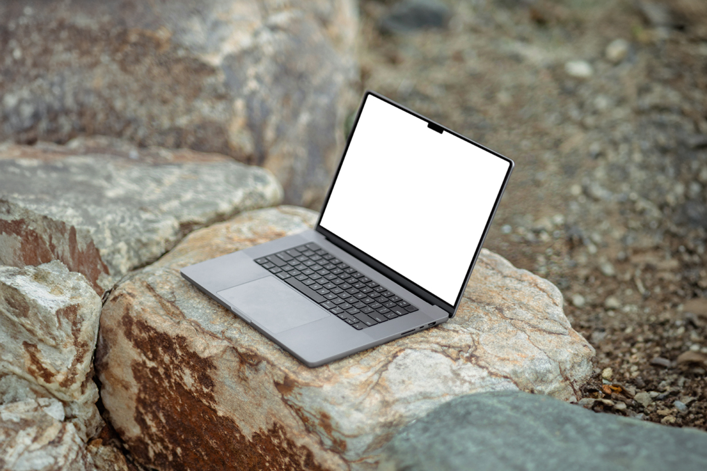 Free MacBook Pro on Rock Mockup — Mr.Mockup