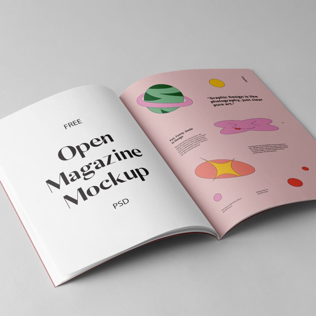 Open A4 magazine mockup with colorful design laying on the gray floor.