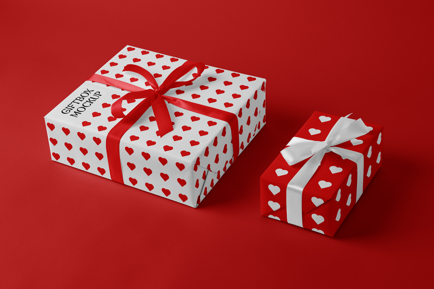 Valentine's gift boxes mockup with ribbon laying on the red floor.