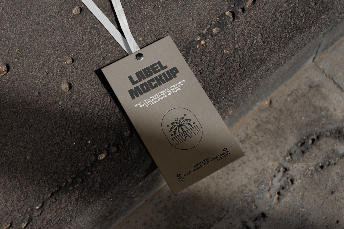 Brown paper tag laying on big concrete stairs.