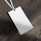 Paper tag laying on concrete stairs from outdoor apparel mockups vol.2.