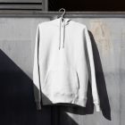 Hoodie hanging in front of metal wall form outdoor apparel mockups vol.2.