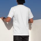 Man standing backwards wearing white t-shirt from outdoor apparel mockups vol.2.