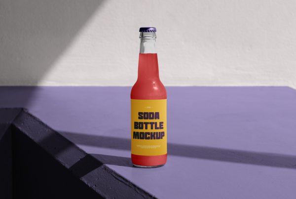 Soda bottle mockup standing on the purple floor in front of the beige wall.