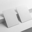 Two a4 white magazines from studio magazine mockups.