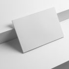 Blank horizontal magazine cover on white cube from studio magazine mockups.
