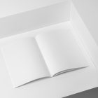 Open blank a4 magazine on white cubes from studio magazine mockups.