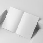 Open blank a4 magazine on white cubes from studio magazine mockups.