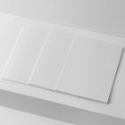 Three a4 white magazines on white cubes from studio magazine mockups.