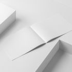 Horizontal white magazines on white cubes from studio magazine mockups.