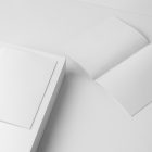 Two a4 white magazines on white cubes from studio magazine mockups.