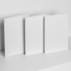 Three white a4 magazines studio scene from studio magazine mockup.