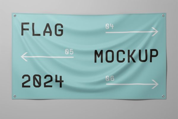Front view, horizontal green flag mockup hanging on the gray wall.