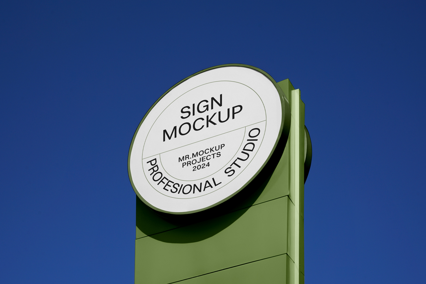 Front view, circle sign mockup attached to the green construction, with a visible sky behind.
