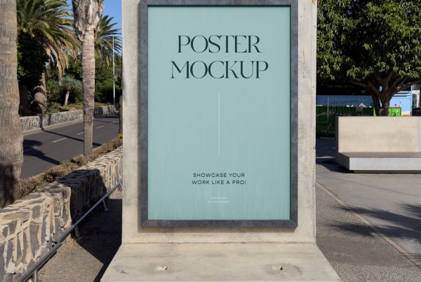 Front view, citylight street poster attached to the concrete pedestal standing in front of the city.