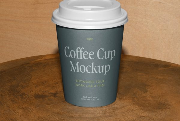 Front view, coffee cup mockup standing on the wooden stool in front of the wooden wall.