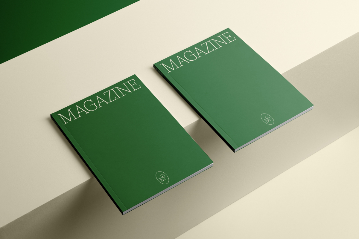 Two a4 green mgazines with elegant design on cubes from studio magazine mockups.