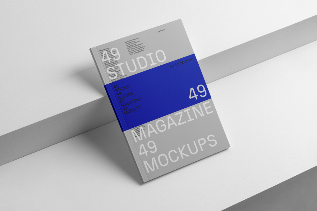 Gray a4 magazine on white cubes from studio magazine mockup.