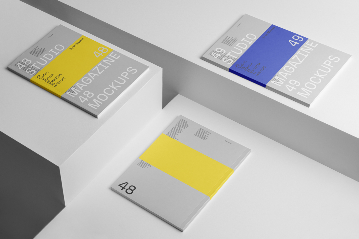 Three gray a4 magazine with minimal design on white cubes from studio magazine mockups.